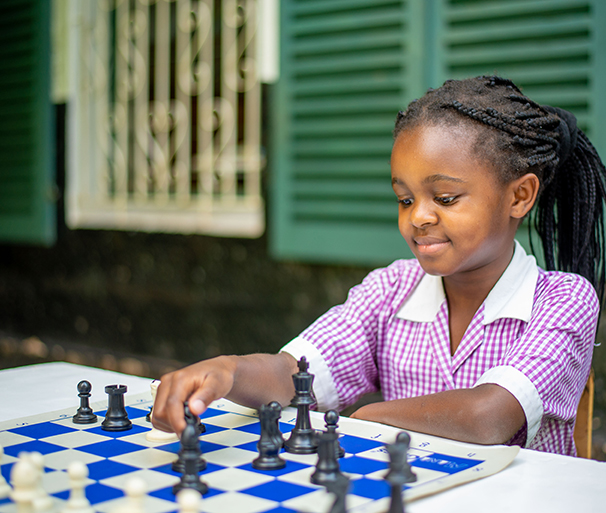 Riara primary school pupil playing chess