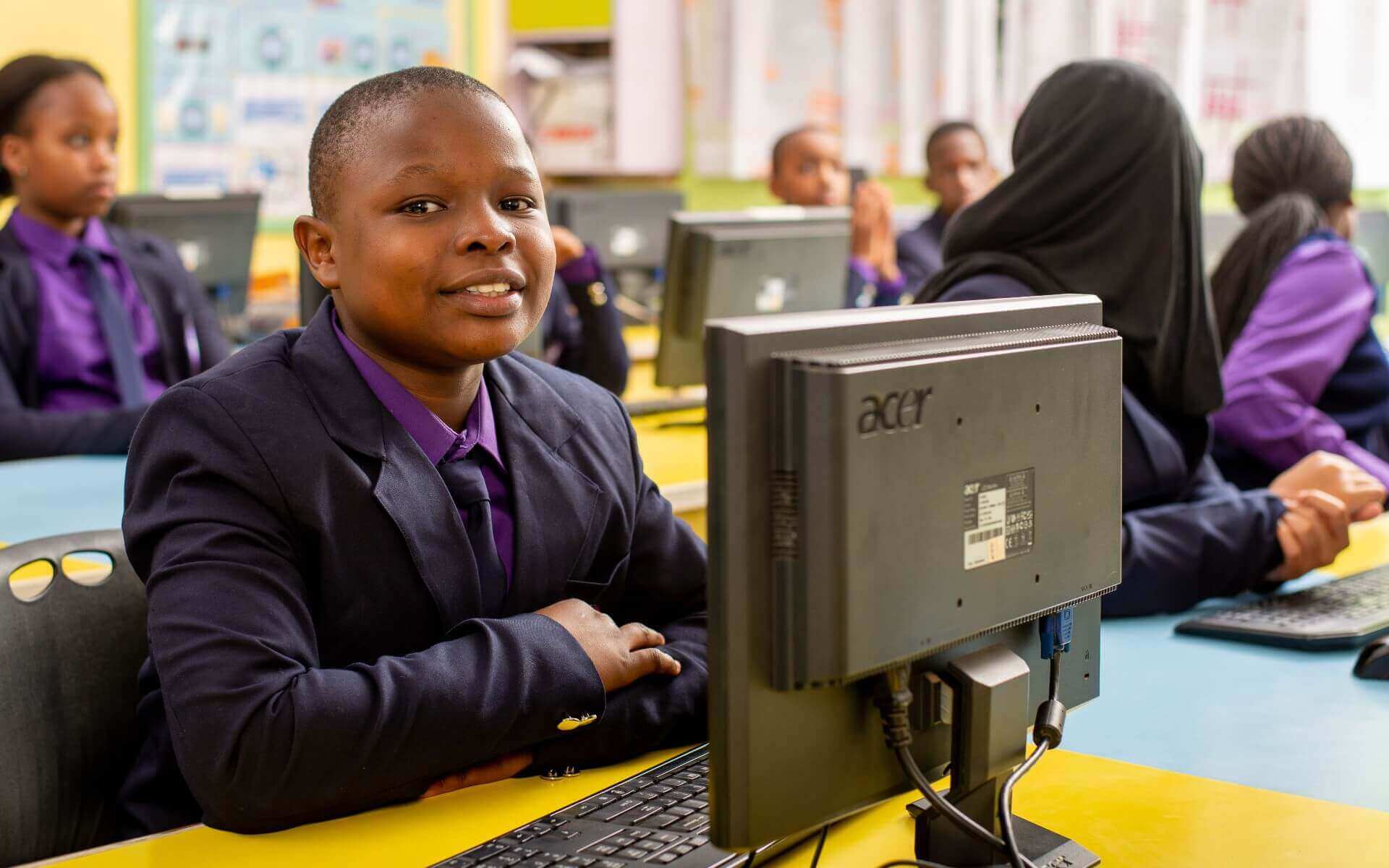 Riara springs junior high school students in a computer lab each at their own desktop