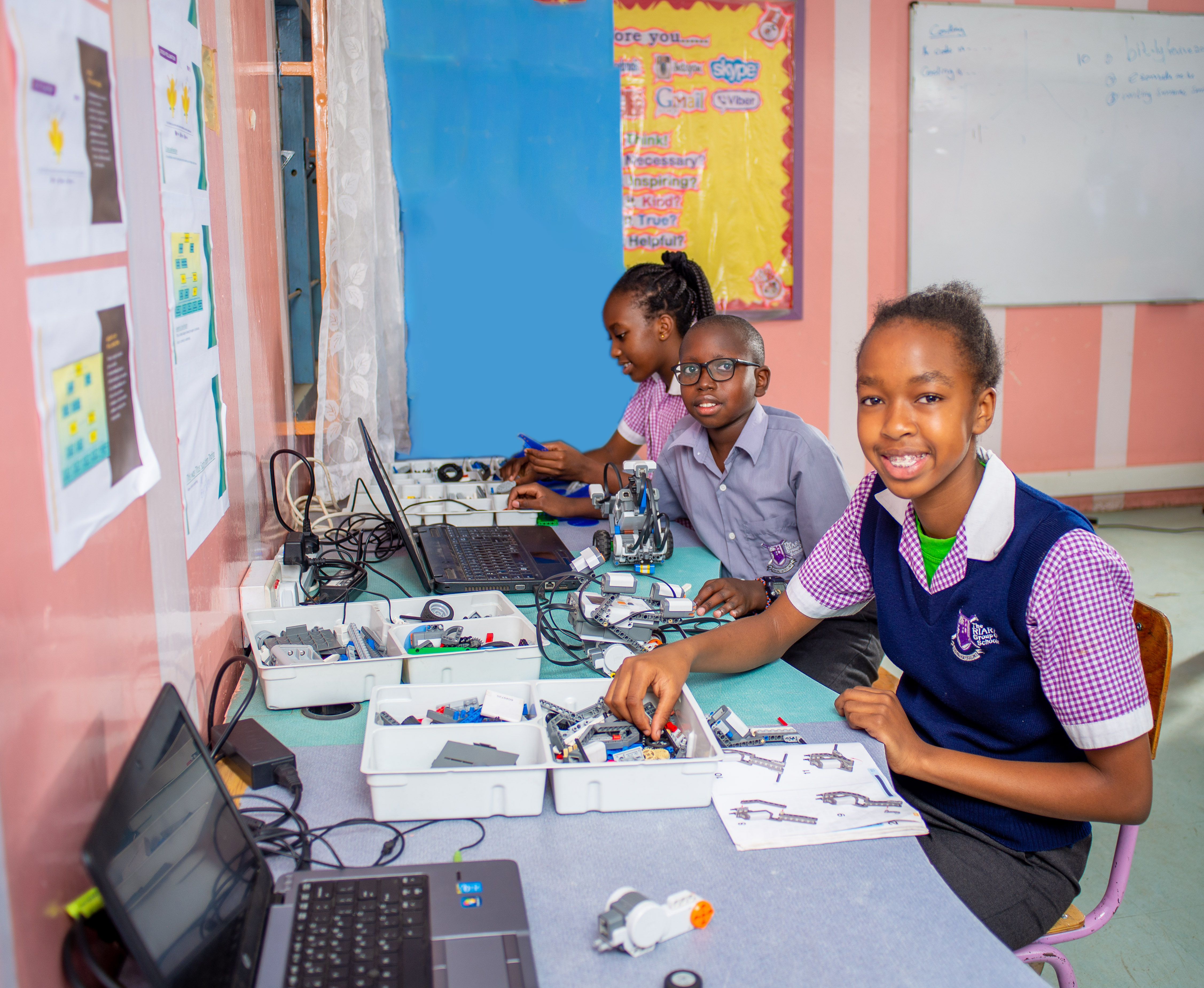 Riara Springs Primary School pupils in the lab creating robots
