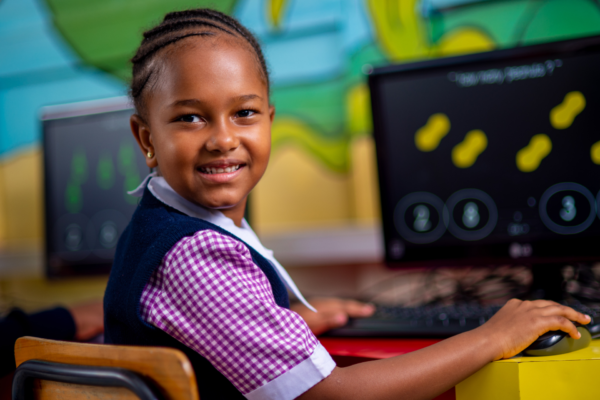 Riara Kindergartens pupil on the computer